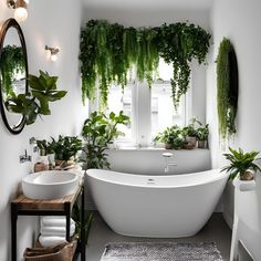 a white bath tub sitting next to a sink under a window covered in green plants