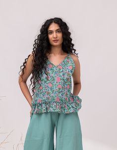 "STRING PEPLUM TOP | Ruffle Waist Blouse | Summer Sleeveless Top | Cropped Blouse Women | V Neck Linen Sleeveless Blouse >KNOW YOUR TOP< - standard fit - available in printed 100% cotton and Linen blend fabrics  - the model is 172 cm high (regular XS - S) and is wearing size S.  - print in the picture - P10 - (Please choose colors from drop down menu). >FIT< - The top is of standard fit >COLOR< - The top is available in 36 printed cotton fabrics and 40 Linen Cotton Blend Fabrics  - We found out the fabric to be rather hard to photograph to have an exact color for exposure - fabric wrinkles often catches unexpected light and show thousands of shades in different positions and certain lights. The actual colors also vary due to your computer resolution and monitor color restrictions. >SIZING< Peplum Sleeveless Top, Casual Ruffled Sleeveless Camisole, Sleeveless Vest Blouse For Summer, Sleeveless Summer Peplum Top, Green Sleeveless Vest Blouse, Green Ruffled Cami Top, Sleeveless Casual Peplum Top For Summer, Green Sleeveless Cotton Camisole, Casual Sleeveless Peplum Top For Summer