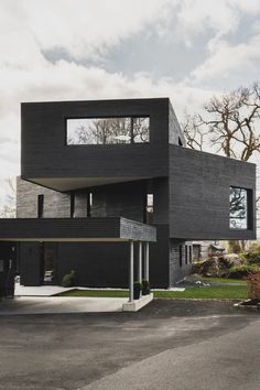 a large black building with lots of windows