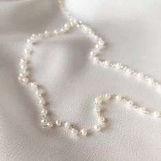 "Delicate Pearl Rosary Necklace. Looking for: - a Stunning Wedding Necklace - a Simple and Attractive necklace that can be worn on so many occasions - a Lovely touch to your day to day style Whatever the reason may be, this pearl necklace is perfect for every occasion. This pearl necklace is the PERFECT GIFT for every Woman. So delicate and feminine. We use only HIGH QUALITY materials and offer guarantee on our necklaces. We are a 5-Star Seller. Check our reviews and see what our customers say a Small Pearl Necklace, Rosary Chain Necklace, Rosary Style Necklace, Pearl Rosary, Pearl Chain Necklace, Rosary Necklace, Rosary Chain, Necklace Wedding, Freshwater Pearl Necklace