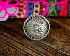 "Here we have a large and substantial old tribal silver ring from Rajasthan, India. A dome top with engraved flowers and a thick and sturdy ring band. Measurements are: Size: 6.5 Top Diameter: 30mm (1.2\") Top Height: 23mm (almost 1\") Weight: 19gr. This ring ships registered priority and with tracking! :-) ❀ Please read my shop and return policies before purchasing ❀ https://www.etsy.com/shop/CosmicNorbu/policy?ref=shopinfo_policies_leftnav" Traditional Silver Engraved Ring, Bohemian Silver Engraved Ring, Bohemian Engraved Ring With Intricate Design, Traditional Silver Rings For Rituals, Ring Indian, Moroccan Jewelry, Engraved Flower, Cute Letters, Lapis Lazuli Ring