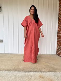 Embrace the gentle waves and sunny shores with our double gauze cotton kaftan. This versatile caftan falls gracefully between the knees or ankles, depending on the length you choose. It's the ultimate in loungewear for women - perfect as a beach dress or cover up. Crafted from light and airy double gauze cotton, it's your essential for a night on the town, a day by the sea, or just running errands. Casual V-neck Kaftan For Daywear, Spring Oversized Loungewear Maxi Dress, Oversized Maxi Dress For Spring Loungewear, Oversized Spring Maxi Dress For Loungewear, Oversized Kaftan For Spring Loungewear, Spring Casual Unlined Kaftan, Cotton Maxi Dress With Relaxed Fit, Unlined, Relaxed Fit Kaftan For Loungewear In Spring, Relaxed Fit Cotton Maxi Dress Unlined