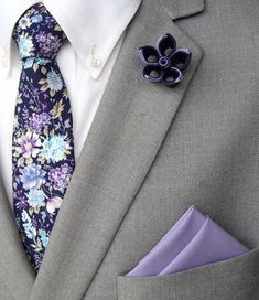 "Handmade Kanzashi Flower Lapel Pin paired with a Tie & Handmade Pocket Square Flower Size: 1.5\" Pocket Square 12in X 12in Tie: 100% Silk Tie: 59in length x 3.25 in at widest Your choice of items! Full set includes one handmade flower lapel pin paired to match with a navy floral tie & handmade lavender purple pocket square. This set is the perfect gift! Each one of our lapel flowers is handmade and unique. Handmade items are made-to-order so they will be similar to the one show in this listing, Purple Floral Tie Wedding, Purple Floral Tie, Floral Tie Wedding, Lapel Flowers, Mens Suit Accessories, Flower Lapel, Dog Suit, Flower Tie, Flower Lapel Pin