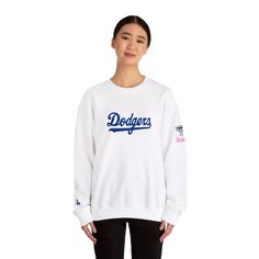 Super Cute Los Angeles Dodgers Sweatshirt, Ultra-Comfortable Lightweight Sweatshirt.  Baggy Oversized. See Shop for More Colors, Styles, Color-combos.. Support Your Favorite Team with this Dodgers Inspired Oversized Crewneck Sweatshirt     Hoodie-less long sleeve sweat shirt.   Ideal for any situation, a unisex heavy blend crewneck sweatshirt is pure comfort. These garments are made from polyester and cotton.  Made with a medium-heavy fabric blend of 50% cotton and 50% polyester (8.0 oz/yd² (271 Crew Top With Ribbed Cuffs For Sports Events, Dodgers Sweatshirt, Dodgers Fan, Oversized Crewneck, Los Angeles Dodgers, Angeles, Cut And Style, Sweat Shirt, Super Cute