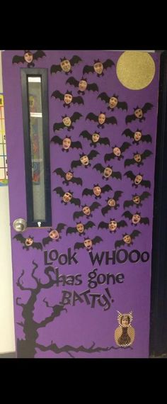 a door decorated with bats and the words look whooo has gone bats