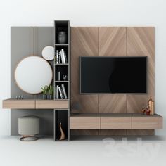 an entertainment center with bookshelves, shelves and a flat screen tv mounted on the wall