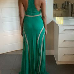 Beautiful Nwt Emerald Green Dress With Stretchy Material And Sheer Cutout Details. High Neck And Racer Back With Zipper. Perfect For A Gala, Christmas Holiday Parties Or Being A Wedding Guest. Very Long So Its Ideal For Tall Women Or For Wearing With High Heels. Green Sleeveless Maxi Dress With Sweep Train, Sleeveless Green Dresses With Sweep Train, Green Sleeveless Dress With Sweep Train, Sleeveless Green Dress With Sweep Train, Green Backless Maxi Dress For Night Out, Green Sweep Train Dress For Homecoming, Green Backless Gown For Prom, Green Backless Prom Gown, Green Floor-length Dress With Sweep Train