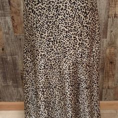 Nwt Chicos Womens Skirt Is Made From A Silky Slightly Stretchy Fabric With A Leopard Cheetah Print. The Long Skirt Has A Flared Hem And Is Fully Lined. Chico's Size Chicos Sz 0 (4-6), With The Following Measurements: Waist: 30" Hips: 40" Total Length: 32" Please Email With Any Questions. Fitted Long Skirt In Leopard Print, Flowy Leopard Print Skirt For Spring, Leopard Print Lined Bottoms With Relaxed Fit, Spring Fitted Leopard Print Skirt, Casual Leopard Print Flowy Skirt, Leopard Print Long Skirt For Spring, Casual Flowy Leopard Print Skirt, Spring Leopard Print Fitted Skirt, Long Leopard Print Skirt For Spring