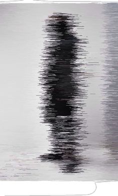 a black and white image of a person standing in the water with their head turned to the side