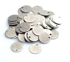 large metal disc charms with holes on each side