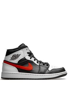 Black/white leatherr/rubber Air Jordan 1 Mid sneakers from JORDAN featuring round toe, flat rubber sole, front lace-up fastening, branded insole and ankle-length. These styles are supplied by a premium sneaker marketplace. Stocking only the most sought-after footwear, they source and curate some of the most hard to find sneakers from around the world.. | Jordan Mid sneakers Jordan Mid, Mid Sneakers, All Nike Shoes, Jordan Air, Red Sneakers, Air Jordan 1 Mid, Jordan 1 Mid, Dream Shoes, Nike Sneakers