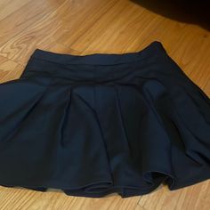 Black Pleated Skirt Never Worn Smoke Free Home High Waist Black Pleated Skort, Black High Waist Pleated Tennis Skirt, High Waist Black Skort With Lined Skirt, High Waist Black Lined Skort, Black Pleated Short Tennis Skirt, Black Mini Skort With Pleated Details, Black High Waist Lined Tennis Skirt, Black Pleated Skort Short Length, Black Short Lined Skirt