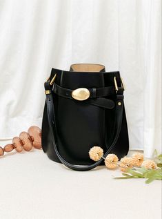 Classic black leather bucket purses for trendy ladies Elegant Large Capacity Bucket-shape Shoulder Bag, Classic Satchel Bucket Bag For Office, Elegant Satchel Bucket Bag With Detachable Strap, Daily Use Bucket Shoulder Bag With Gold-tone Hardware, Classic Office Satchel Bucket Bag, Gold-tone Hardware Bucket Shoulder Bag For Daily Use, Leather Bags With Hasp Closure For Daily Use, Leather Shoulder Bag With Metal Hardware For Daily Use, Classic Top Handle Bucket Bag With Large Capacity