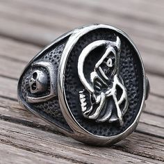 Surface Width: 23mm Shape pattern: Skeleton Ring Size: 7,8,9,10,11,12 Other Style: Fashion, Cool, Vintage, Biker, Viking, Nordic Occasion: Wedding, Anniversary, Engagement, Gift, Party Material: Stainless Steel Item Type: Rings Gender: Men and Women Fine or Fashion: Fashion Unlock the Spiritual Power: Santa Muerte Ring Embrace the mystique of the Santa Muerte ring, crafted from durable stainless steel with a unique design featuring Santa Muerte's charm. Learn about its historical roots and moder Skeleton Ring, Biker Rings, Vintage Biker, Gothic Rings, Ring Men, Ring Shapes, Viking Jewelry, Lady Biker, Skull And Crossbones