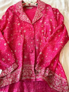 Beautiful embroidered blouse  size 12  deep pink with white and gold threads good condition Silk V-neck Top With Embroidery, Festive Silk Top With Chikankari Embroidery, Silk Top With Chikankari Embroidery For Spring, Pink Long Sleeve Festive Tops, Pink Long Sleeve Tops For Festive Occasions, Festive Pink Tops With Chikankari Embroidery, Traditional Pink V-neck Blouse, Silk Long Sleeve Tops With Floral Embroidery, Silk Tops With Floral Embroidery And Long Sleeves