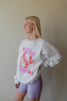 Snuggle up in the QUEEN OF WESTERN HEARTS GRAPHIC CREW. This oversized sweatshirt is so comfy, you'll feel like royalty. Pair it with leggings, bike shorts, or denim for a stylish and effortless look! Perfect for ruling the fashion game while bringing out a touch of your inner western queen! 50% COTTON 50% POLYESTER Oversized Sweatshirt, Bike Shorts, The Queen, Fashion Games, The Fashion, Feel Like, Royalty, Bring It On, Queen