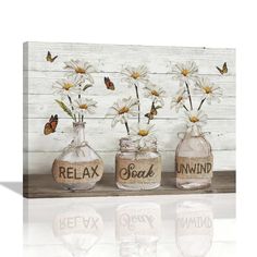 three glass vases with daisies in them and the words relax, relax and be mind