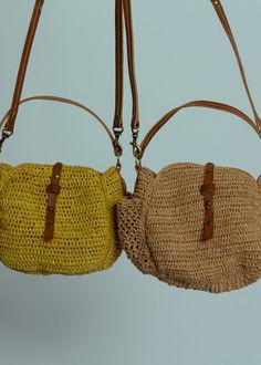 Sans Arcidet's Sam Mini Bag is crafted of natural crocheted raffia and features a tab closure, exterior pockets and a detachable faux leather shoulder strap. Measures approximately 7" x 3" x 6". Color tea. 100% raffia. Lining 100% cotton. Handle 88% polyurethane, 8% polyester, 2% cotton, 2% leather. Made in Madagascar. Natural Satchel Straw Bag With Detachable Strap, Natural Straw Satchel Bag With Detachable Strap, Natural Straw Shoulder Bag With Detachable Strap, Summer Natural Satchel With Detachable Strap, Natural Satchel With Detachable Strap For Beach, Natural Color Satchel With Detachable Strap For Beach, Natural Satchel With Detachable Strap For Summer, Daily Use Straw Crochet Crossbody Bag, Straw Satchel Shoulder Bag With Adjustable Strap