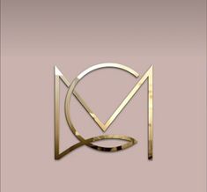 a gold and silver logo with the letter m in it's center on a pink background