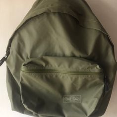 Eastpak Nwt Olive Green Small Bagpack Classic Outdoor Bag With Zipper Pocket, Classic Outdoor Bags With Pockets, Outdoor Satchel Bag For Back To School, Everyday Khaki Bags For Back To School, Classic Green Standard Backpack, Classic School Bags With Pockets, Back To School Satchel For Outdoor Use, Classic Green Backpack For Everyday, Back To School Khaki Bags For Daily Use