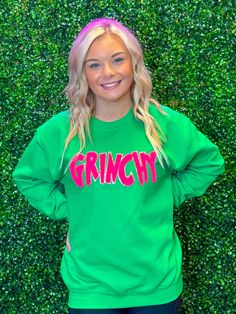 Add a dash of Christmas cheer to your wardrobe with this Hot Pink GRINCHY Chenille Sweatshirt! Featuring an Irish green sweatshirt with a hot pink GRINCHY chenille, it's the perfect accessory for your favorite movie, Christmas morning, party, or pajama outfit. Comfy and fun, everybody needs one of these for some holiday cheer! Unisex sizing and fit Available in Adult Sizes SPECIAL CARE - WASHING INSTRUCTIONS: Hand washing and air drying are always best for these items. Wash on delicate, cold, an Holiday Green Cotton Sweatshirt, Green Cotton Holiday Sweatshirt, Casual Green Holiday Sweatshirt, Casual Green Sweatshirt For Holidays, Green Holiday Sweatshirt For Fall, Green Fall Holiday Sweatshirt, Nashville Birthday Shirts, Nashville Birthday, Chenille Sweatshirt