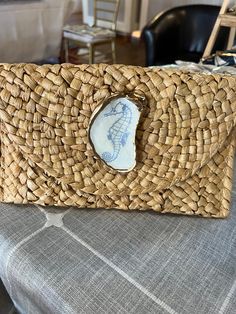 Unique one-of-a-kind oyster shell woven clutch purse. This purse is perfect for your upcoming vacation, cruise, trip to a beach resort or for next summers beachy outfits.  The straw purse has been woven by overseas artisans and finished off with an decoupage oyster that is unique and one-of-a-kind with a nautical touch.   I have many options to choose from if you don't like one of the shell design options that you see send me a message in the note to seller column and I can make the color or style of oyster shell that you would like. Handmade Summer Clutch As Gift, Rectangular Summer Clutch For Gift, Summer Gift Clutch Rectangular Shape, Summer Gift Rectangular Clutch, Summer Woven Clutch Gift, Summer Woven Clutch As Gift, Summer Handheld Clutch As Gift, Summer Gift Woven Clutch, Summer Woven Clutch Perfect For Gift