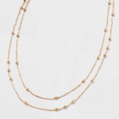 Elegantly adorn your neck with the Gold 2-Row Satellite Chain Necklace from A New Day™. This two-row necklace features satellite chains for a beautiful look that's perfect for everyday wear or special occasions. Offering a comfortable fit with the lobster claw clasp closure and an extender chain, this necklace makes a perfect choice for gifting and accessorizing, and the nickel-free construction makes it great for sensitive skin. A New Day™: Style that goes wherever you do. The Lobster, Dress Indian, Jewelry Accessories Ideas, Accessories Ideas, The Gold, A New Day, Cotton Dress, Lobster Claw, New Day