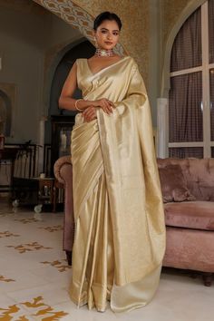 Gold saree with zari hand woven motifs. Comes with unstitched blouse piece. - Aza Fashions Elegant Chanderi Pre-draped Saree For Navratri, Elegant Banarasi Silk Pre-draped Saree For Formal Occasions, Elegant Formal Banarasi Silk Pre-draped Saree, Formal Pre-draped Chanderi Saree With Self Design, Elegant Gold Banarasi Silk Pre-draped Saree, Formal Tussar Silk Pre-draped Saree With Dupatta, Elegant Art Silk Pre-draped Saree With Cutdana, Traditional Formal Chanderi Pre-draped Saree, Formal Pre-draped Saree With Zari Weaving For Eid