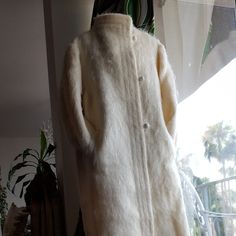 Reposhing This Item I Purchased From @13orchids. This Was The Perfect Coat For A Beautiful Winter Wedding. Ready And Waiting In It's Original Box For The Next Chapter In Memory Making! Revillon Fur Coat, Full Length Cream Ivory Mohair Wool Vintage Winter Overcoat. Known For It's Silk Like Texture And Sheen, The Angora Goat Hair Transforms Into A Soft Silk Like Fabric Known As "Diamond Fiber". Satin Lined With 3 Button Down Front Closure With A High Collar. Made By Revillon Furs Paris - New York Long Fall Wedding Outerwear, Classic Beige Outerwear For Wedding, Long Winter Wedding Outerwear, Cream Winter Wedding Outerwear, Classic White Long Outerwear, Winter White Long Sleeve Outerwear For Wedding, Classic White Wedding Outerwear, Vintage Winter Wedding Outerwear, Cream Fitted Outerwear For Wedding