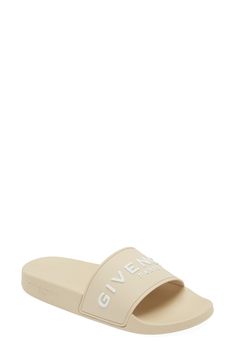 A bold Givenchy logo stamp crosses the wide strap of cushy, water-friendly sliders. Synthetic upper, lining and sole Made in Italy Women's Designer Shoes Luxury Summer Slides With Rubber Sole, Designer Slides With Branded Insole For Beach, Designer Beach Slides With Branded Insole, Luxury Beach Slides With Rubber Sole, Designer Slides For Summer, Designer Beach Slides With Cushioned Footbed, Logo Print Slip-on Sandals For Summer, Designer Summer Slides With Removable Insole, Slip-on Sandals With Logo Print For Summer