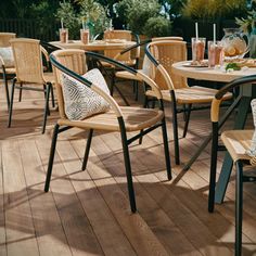 an outdoor dining area with tables and chairs