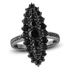 a black diamond ring is shown on a white background and it's surrounded by smaller black diamonds