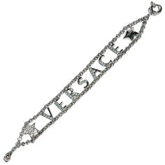 Authentic Vintage 90s Gianni Versace Silver Metal Chain Link Spellout Logo Bracelet With Lt. Blue Rhinestones. Signed. Measures: 7.25” Long .75” Wide -Does Have Some Scratches And The Base Metal Is Showing Through On The Backside Only. No Missing Stones. Versace Bracelet, Versace Jewelry, Metal Chain Link, Rhinestone Bracelet, Gianni Versace, Blue Rhinestones, Base Metal, Metal Chain, Womens Jewelry Bracelets