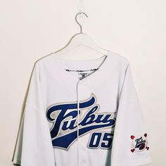 Vintage y2k white Fubu jersey. FUBU 05 Jersey. FUBU 05 graphic logo on chest embroidered badges on sleeve and chest. button up jersey. FUBU ATHLETICS 1992  Fubu jersey Fubu top Fubu shirt Fubu t shirt P2P 31 INCH, LENGTH 36 INCH Size XXXL / Good condition UK AND WORLDWIDE SHIPPING SERVICE  FULLY TRACKABLE SHIPPING SERVICE White College Jersey With Letter Print, College White Jersey With Letter Print, White College Jersey With Team Logo, College White Jersey With Team Logo, White Varsity Jersey With Team Logo, White College Baseball Jersey With Team Logo, White Baseball Jersey With Team Logo For College, White Cotton Team Logo Jersey, White Cotton Jersey With Team Logo