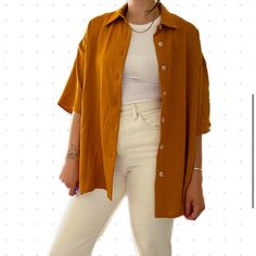 This Oversized Short Sleeve Buttondown Is So Cool But For Some Reason I Just Never Reached For It. Take It And Give It New Life!! Wear It Buttoned All The Way Up For Work, Wear It Open With A Bralette, Wear It As A Light Layer Over A Cute Outfit. I’m 5’5” And Typically A Small - See Image For How This Fits Me! Trendy Button-up Shirt With Rolled Sleeves, Casual Oversized Blouse With Rolled Sleeves, Oversized Tops With Snap Buttons For Everyday, Casual Brown Blouse With Buttons, Oversized Brown Shirt For Spring, Oversized Brown Shirt With Button Closure, Trendy Brown Shirt For Day Out, Oversized Collared Casual Blouse, Oversized Collared Shirt With Snap Buttons