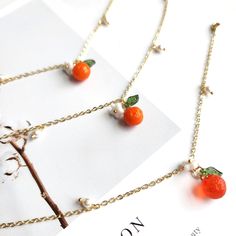 Our cute glass orange bracelets are a perfect match with our orange earrings and necklace. The bracelets are made with Czech glass orange, glass flower, acrylic leaf, handmade pearls and 14k gold plated chains which are good for delicate skin. We have silver version available as well, please contact seller for details. Size: the length is about 7" with 1.25" extender Orange Necklace With Adjustable Chain For Gift, Orange Necklace With Adjustable Chain As Gift, Orange Dainty Jewelry For Gifts, Dainty Orange Jewelry For Gifts, Dainty Orange Jewelry For Gift, Elegant Orange Bracelet For Gift, Handmade Orange Necklaces For Party, Adjustable Orange Necklace For Gifts, Adjustable Orange Necklace For Gift