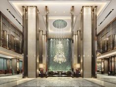 an elegant lobby with chandelier and marble flooring is pictured in this rendering