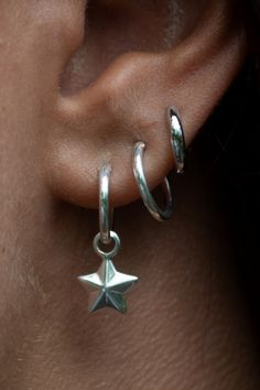 SILVER FACETED STAR CHARM HOOP EARRINGS BY LILY CHARMED Silver Ring Earrings, Hoop Earrings With Dangles, Two Earrings One Ear, Silver Ear Piercings, Ear Piercings Silver, Silver Jewellery Earrings, Piercings Silver, Silver Earrings Aesthetic, Chunky Silver Jewellery