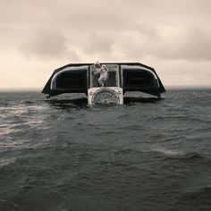 a large boat floating on top of a body of water