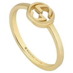 Gucci Interlocking G 18ct Yellow Gold Ring YBC679115001 The Interlocking G, an archival emblem dating back to the '60s appears as a subtle design detail on this 18k yellow gold ring. House symbols are reimagined throughout Gucci Aria in celebration of both the past and present. Width: 6.4mm. This item will arrive beautifully packaged in a unique Gucci presentation box. Gucci Fine Jewelry Rings For Formal Occasions, Gucci Formal Fine Jewelry Rings, Gucci Fine Jewelry Yellow Gold Rings, Gucci Gold Fine Jewelry Rings, Gucci Yellow Gold Fine Jewelry Rings, Designer Gucci Rings With Polished Finish, Designer Gucci Yellow Gold Rings, Gucci Rings With Polished Finish For Formal Occasions, Gucci Yellow Gold Rings For Formal Occasions