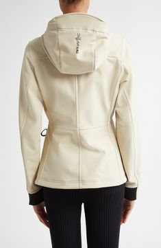 The Italian label known for its impeccable outerwear brings forth a cold-weather essential boasting a stretchy, lightweight fabrication and a protective hood. 25" length (size 2) Two-way front-zip closure Drawcord-toggle hood Front zip pockets Lined 53% polyester, 35% polyamide, 2% elastane Machine wash, line dry Imported Designer Clothing Sporty Fitted Outerwear With Double-lined Hood, Fitted Nylon Outerwear With Detachable Hood, Windproof Stretch Winter Outerwear, Stretch Hooded Outerwear For Outdoor, Stretch Windproof Outerwear For Outdoor Activities, Stretch Windproof Outerwear For Outdoor, Fitted Outerwear With Detachable Hood, Fitted Nylon Hooded Jacket With Detachable Hood, Functional Fitted Outerwear With Detachable Hood