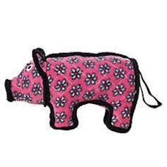 a pink and black dog pillow with flowers on it