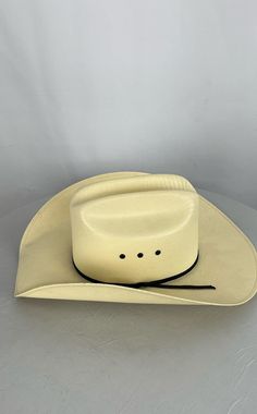 Double SS Cream/Solid Cowboy Hat - Size 7 Brand: Double SS Type: Cowboy HatCondition: Fair - shows sign of wear Size: 7 Color/Pattern: Cream/Solid *Please fully inspect the listing's photographs, item specifics, and description. *Have questions? Ask away, and we will respond as soon as possible! We are always happy to provide additional information and photos. *Change your mind? You can return your item within 30 days for your money back. *We ship using USPS Ground Advantage, USPS Priority Mail, and UPS Ground. Shipping options are selected for each listing based on the size and weight of the packaged item. *Everything we sell is packaged and shipped with love by one of our team members, please note our handling time when completing your purchase and estimating delivery time. *When you pur Western Panama Hat With Flat Bill For Country Events, Western Panama Hat For Country Events, Western Style Flat Bill Panama Hat For Country Events, Country Style Flat Bill Hats For Rodeo, Country Style Straw Hat For Western-themed Events, Classic Sun Hat For Rodeo, One Size, Classic Sun Hat For Rodeo, One Size Fits Most, Classic Sun Hat One Size For Rodeo, Western Style Adjustable Panama Hat With Flat Bill