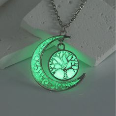 Necklace -Moon & Tree of Life -Glow In The Dark Alloy Moon and Tree of Life Pendant Necklace, Glow In The Dark Jewelry, Light Green SKU: 658738335675 Categories: Necklaces, Pendant, Jewelry, Chain Necklace, Necklace, Unisex Necklace, Glow in the Dark Pendant Tags: Glow in the Dark, Tree of Life, Crescent Moon, Pendants, Moon, Luminaries Stone Necklace, Green SYMBOL: The moon is a reflection of the sun. It symbolizes the accomplished woman that, through several cycles has acquired true knowledge. The one that comes only with insight. Also associated with dreams and the bearing of new projects or children. Size: about 17.7 inch(45cm) long, extension chain: 1.97 inch(50mm). The pieces that will be delivered are similar to those in the photographs The necklace is included. Moon Tree, Dark Tree, Dark Jewelry, Necklace Moon, Necklaces Pendant, Jewelry Chain, Unisex Necklace, Necklace Green, Tree Of Life Pendant