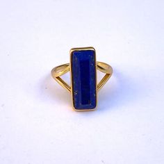 Designed to take space in your life and finger bringing the healing properties of Lapis Lazuli.The bright blue stone promotes self-awareness, peace, and protection. The stone is also associated with helping the wearer to speak their truth and inspire self-expression and inner wisdom. Sterling Silver 925 Gold Plated Ring Size: Adjustable 7 Rectangle Gold Ring, Rectangle Stone Ring, Rectangle Ring, Meditation Accessories, Essential Oil Jewelry, Lapis Lazuli Jewelry, Lapis Ring, Inner Wisdom, Lapis Lazuli Ring