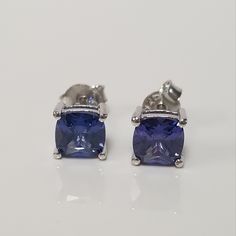 "Thanks for shopping our vintage estate store. We tend to sell well below wholesale and truly hope you enjoy all of our items. Many of the items are one of a kind, so please enjoy scrolling through the pictures and hopefully something will catch your eye. Black spots are from camera. Nice estate sterling silver 925 blue 2ct tanzanite earring studs. This is a custom item made for our store, meaning we set the gem into the setting. Gems testing natural tanzanite, but are created or synthetic. Sett Classic Tanzanite Earrings For Anniversary, Classic Round Tanzanite Earrings, Silver Tanzanite Earrings For Anniversary, Classic Blue Hallmarked Earrings, Blue Silver Earrings For Anniversary, Blue Anniversary Earrings Stamped 925, Classic Silver Tanzanite Earrings, Beach Rings, Princess Earrings