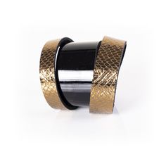 Leather bracelet made of various textures of premium Italian leather. The Golden Wide Leather Cuff has a Swarovski snap closure. This unique artisanal handmade cuff is available in multiple colors. It is a distinctive fashion statement to any wardrobe. This bracelet is a great gift for women. DETAILS 2,75" width 7.87" length Swarovski Snap Closure Black and Gold 100% genuine Italian Leather Handmade Made in USA Leather Bracelet For Women, Great Gifts For Women, Bracelet Leather, The Brave, Anniversary Gift For Her, Handmade Bracelet, Leather Cuffs, Keep Jewelry, Backpack Purse