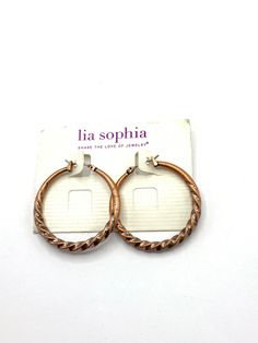 Gorgeous collectible copper round earring by Lia Sophia. Rose Gold Round Hoop Earrings For Pierced Ears, Vintage Bronze Hoop Earrings, Bronze Round Earrings, Bronze Copper Round Earrings, Nickel-free Rose Gold Circle Earrings, Nickel Free Rose Gold Circle Earrings, Bronze Round Hoop Earrings For Gift, Vintage Rose Gold Round Earrings, Brown Metal Hoop Earrings