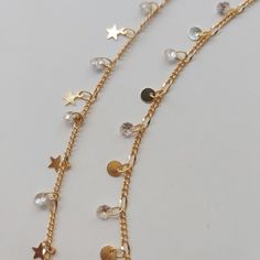 Super cute Pearl Anklet that you will seriously loveee. Effortless, yet adds lots of sparkles and perfect for foot everyday. Makes the PERFECT gift for self or someone awesome. THE PERFECT GIFT 14KT GOLD PLATED Stainless steel GEMSTONE Zircon stone - Each order would be individually gift-wrapped :) - Meticulously handcrafted especially for you! Trendy Gold Anklet With Adjustable Chain, Adjustable Gold Trendy Anklets, Gold Anklets With Star Charm For Gift, Gold Anklet With Star Charm As Gift, Trendy Gold Anklet As Gift, Trendy Gold Anklets Perfect For Gifts, Dainty Gold Anklet With Delicate Chain, Gold Dangle Anklets As Gift, Gold Dangle Anklets For Gift