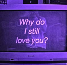 an old tv with the words why do i still love you? on it's screen